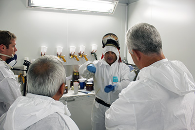 Customers receiving a briefing in new Spray Booth in Manchester