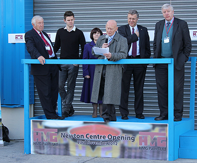 HMG Legend John Newton making a speech infront of the new department named after him